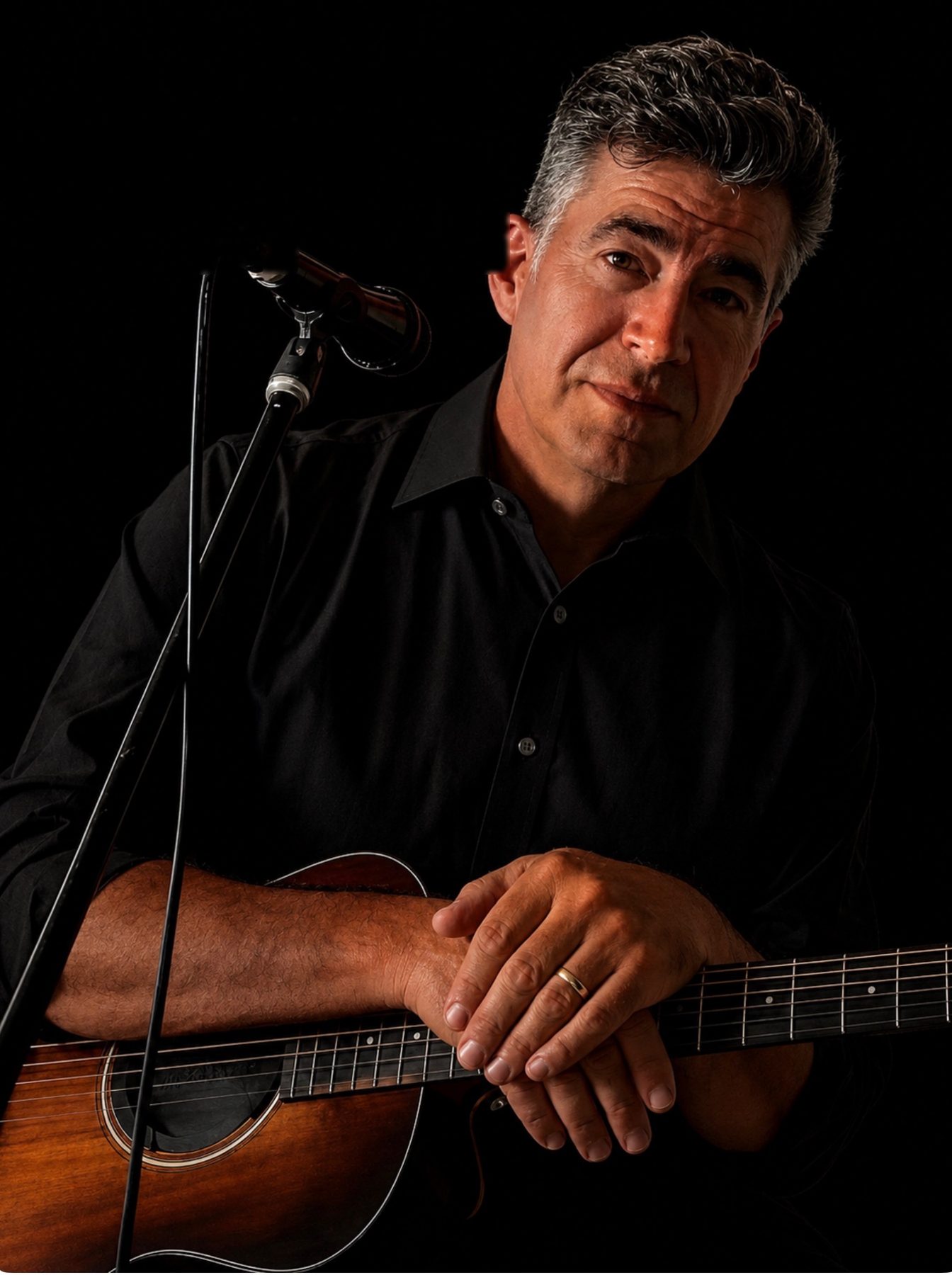 Jon Zanger with his guitar